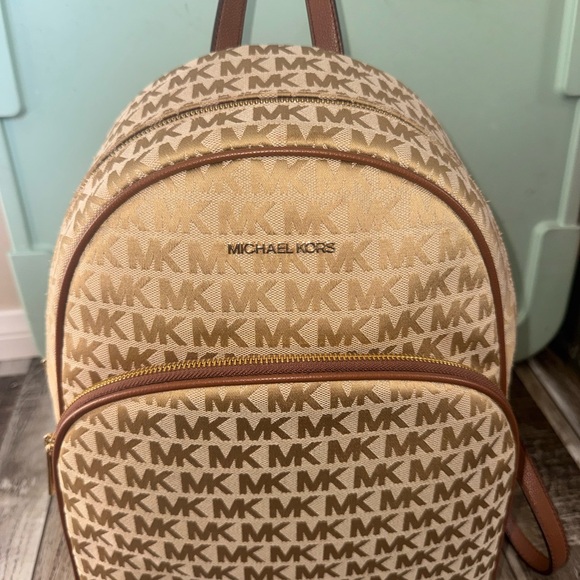 Michael Kors Handbags - Michael Kors Tan Monogram Backpack